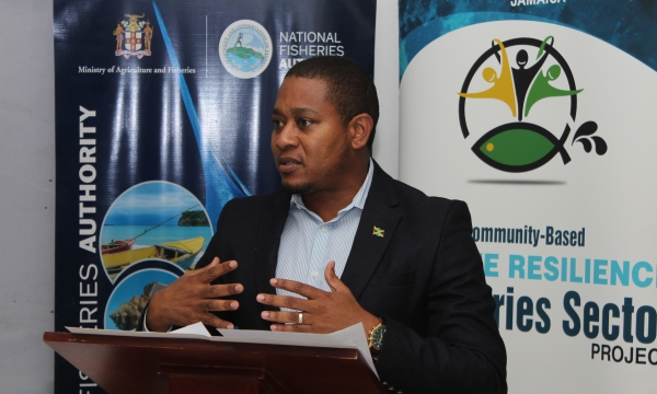 Minister of Agriculture, Fisheries and Mining, Hon. Floyd Green, speaking at the presentation of training certificates and pelagic fishing equipment handing over ceremony held on Wednesday, April 17 at the Discovery Bay Marine Laboratory, Discovery Bay, St. Ann.